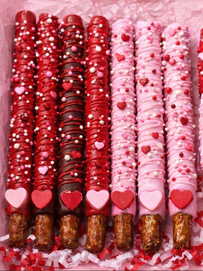 Customized dipped pretzel rods and Rice Krispie pops